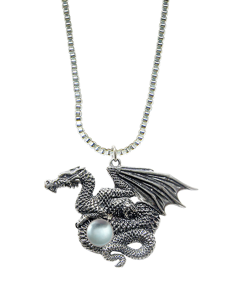 Sterling Silver Dragon of Many Treasures Pendant With Blue Topaz